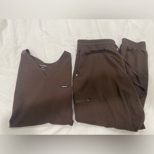 Barely worn. Like new. Color is brown. No rips. No stains.